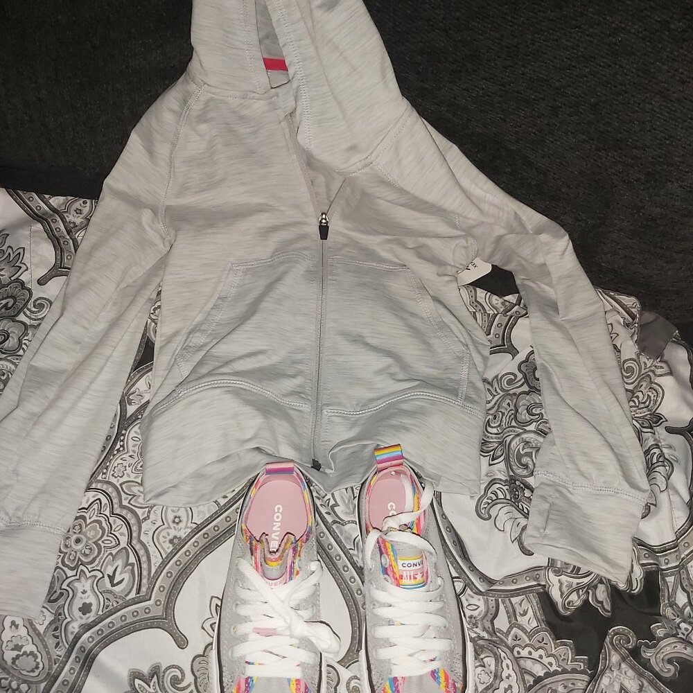 Brand new Casual canvas shoes with a light zip up hoodie.